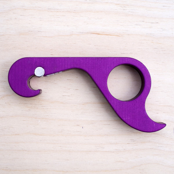 GrabOpener in Purple.  It's strong magnet makes sure its always someplace handy.